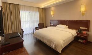 Hunan New Pipaxi Hotel客房内的一张或多张床位