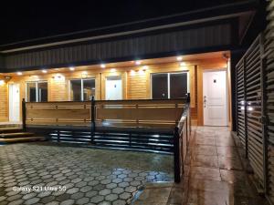 a room with a bench in front of a building at Loft Altos Suite in Puerto Natales