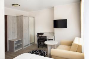 TV tai viihdekeskus majoituspaikassa Villa Andalucia SPA & Leisure