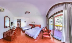 Hunan New Pipaxi Hotel客房内的一张或多张床位