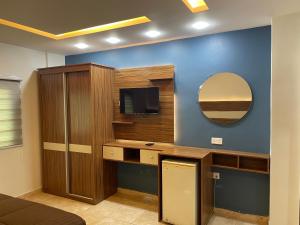 TV a/nebo společenská místnost v ubytování Al Deyafa Hotel
