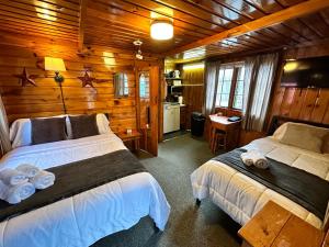 Cama o camas de una habitación en Sun Valley Cottages