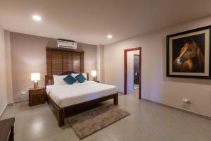 Postel nebo postele na pokoji v ubytování La Casa del Lago Kanchanaburi + 32 fotografií