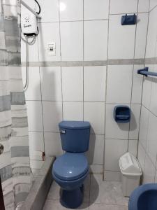 Koupelna v ubytování Hospedaje por departamentos UVIMA III
