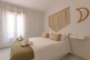 Postel nebo postele na pokoji v ubytování Casa Aya en Centro Cordoba