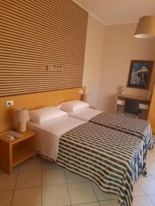 Postel nebo postele na pokoji v ubytování vasco rent rooms