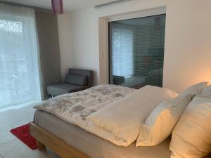 Postel nebo postele na pokoji v ubytování N1 Standalone House Baden