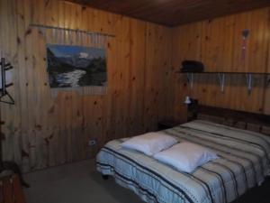 Cama ou camas em um quarto em Sonja's Almhutte