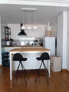 Kuchyň nebo kuchyňský kout v ubytování Apartamento con terraza
