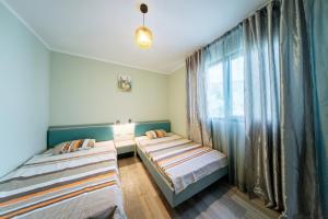 Postel nebo postele na pokoji v ubytování Budva Gate
