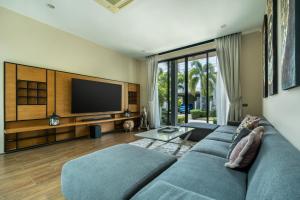 Μια τηλεόραση ή/και κέντρο ψυχαγωγίας στο Baan Bua BT17 by Villacarte