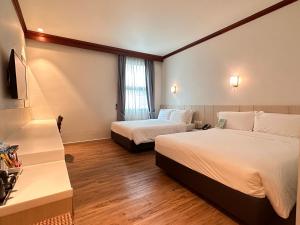 Katil atau katil-katil dalam bilik di Park View Hotel
