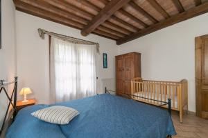Letto o letti in una camera di Stupendo rustico in pietra