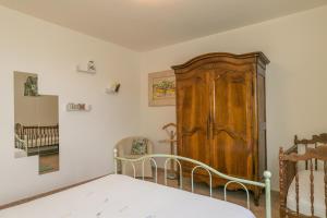 Letto o letti in una camera di Stupendo rustico in pietra