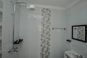 Koupelna v ubytování Eldorado Rustic Hotel
