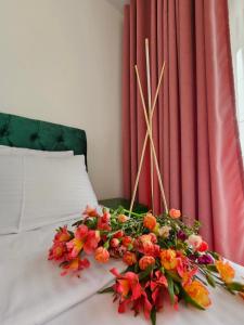 Postel nebo postele na pokoji v ubytování Boutique Hotel Honey