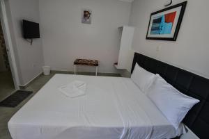 Postel nebo postele na pokoji v ubytování Eldorado Rustic Hotel