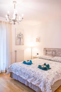 Ліжко або ліжка в номері Dolce Casa Riva