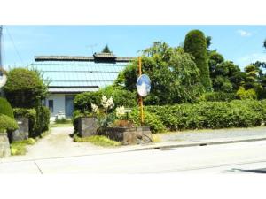 a street sign on the side of a road at Kamitakai-gun - House / Vacation STAY 12362 in Takai