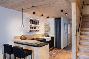 Kuchyň nebo kuchyňský kout v ubytování Gähwindehof Mountain Ranch Resort + 27 fotografií