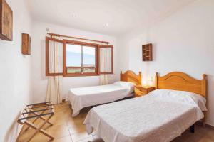 Posteľ alebo postele v izbe v ubytovaní Finca can soler