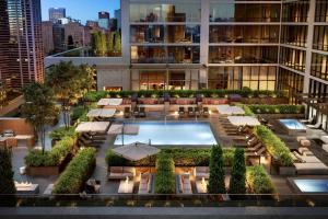 an aerial view of a building with a pool at S Loop Studio w Pool Gym Spa nr Grant Park CHI-739 in Chicago
