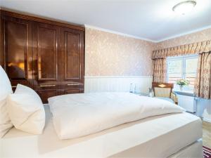 Postel nebo postele na pokoji v ubytování Schloss Frankenberg