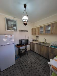Kuchyň nebo kuchyňský kout v ubytování Kaza apartment