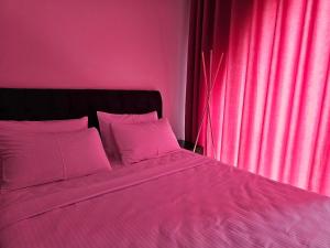 Postel nebo postele na pokoji v ubytování Boutique Hotel Honey