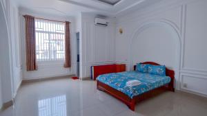 Giường trong phòng chung tại Lavie House 69-7A Phan Chu Trinh
