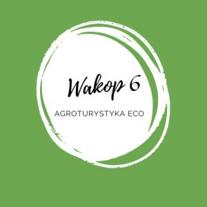 een groene cirkel met de woorden waterloo logo bij Wąkop 6 Agroturystyka Eco in Nowa Słupia
