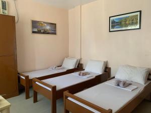 Postel nebo postele na pokoji v ubytování Brielles Travellers Inn