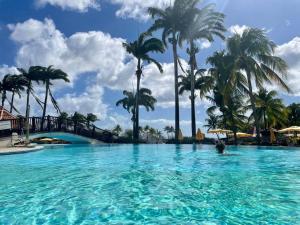 Peldbaseins naktsmītnē Appart avec piscine et vue mer - TAC vai tās tuvumā