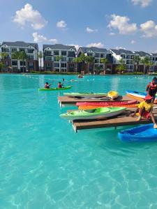 a group of kayaks on a dock in the water at Joy Apartment@The Blyde in Pretoria