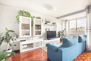 Et tv og/eller underholdning på Apartamento en el centro de Ourense