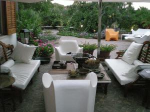 Posedenie v ubytovaní Villa Il Cappero