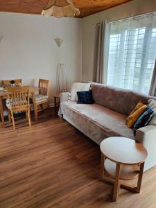 a living room with a couch and a table at Bay View Villas in Bucks Mills