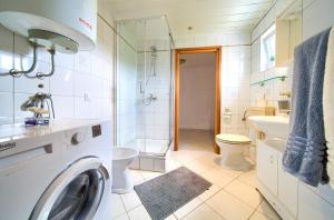 Kúpeľňa v ubytovaní Apartment Mladen + 37 fotografií