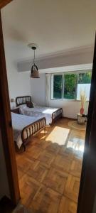 A bed or beds in a room at Primero Seixo antiguo