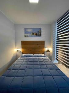 Krevet ili kreveti u jedinici u okviru objekta Perugia Home Apartment La Finestra Di Fronte