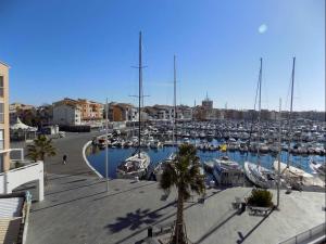 a marina with alot of boats in the water at 5006 Port Brescou 310 in Cap d'Agde