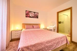 Posteľ alebo postele v izbe v ubytovaní Apartment Mladen