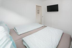 Postel nebo postele na pokoji v ubytování Haus Bielefeld Ferienwohnung 33a