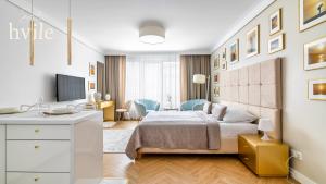 Una televisión o centro de entretenimiento en hvile 149 Gdańsk - prywatne miejsce parkingowe