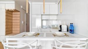 Una cocina o cocineta en hvile 149 Gdańsk - prywatne miejsce parkingowe