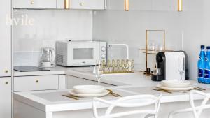 Una cocina o cocineta en hvile 149 Gdańsk - prywatne miejsce parkingowe 4 fotos más