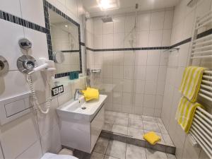 Koupelna v ubytování Montana Haus, Fewo A14, A17, B4 oder C8