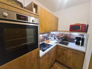 Kuchyň nebo kuchyňský kout v ubytování Montana Haus, Fewo A14, A17, B4 oder C8