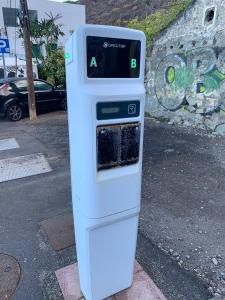 a parking meter sitting on the side of a street at Cosy twin beds El Galeon in Santa Cruz de Tenerife