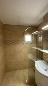 Koupelna v ubytování Apartament spatios aproape de Mures